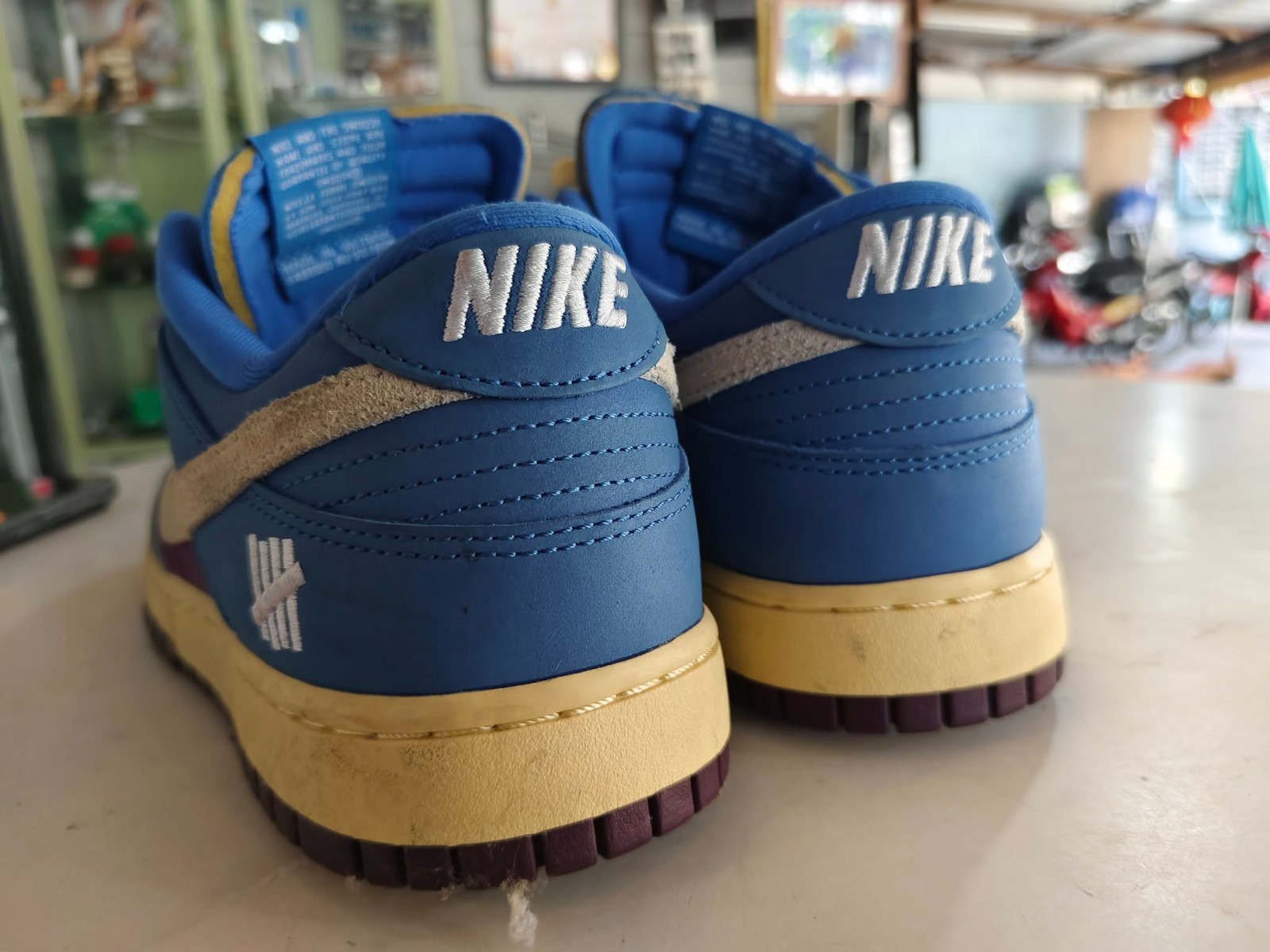 UNDEFEATED’s “Dunk vs. AF-1” Collection Grows With This Snakeskin- Dunk Low