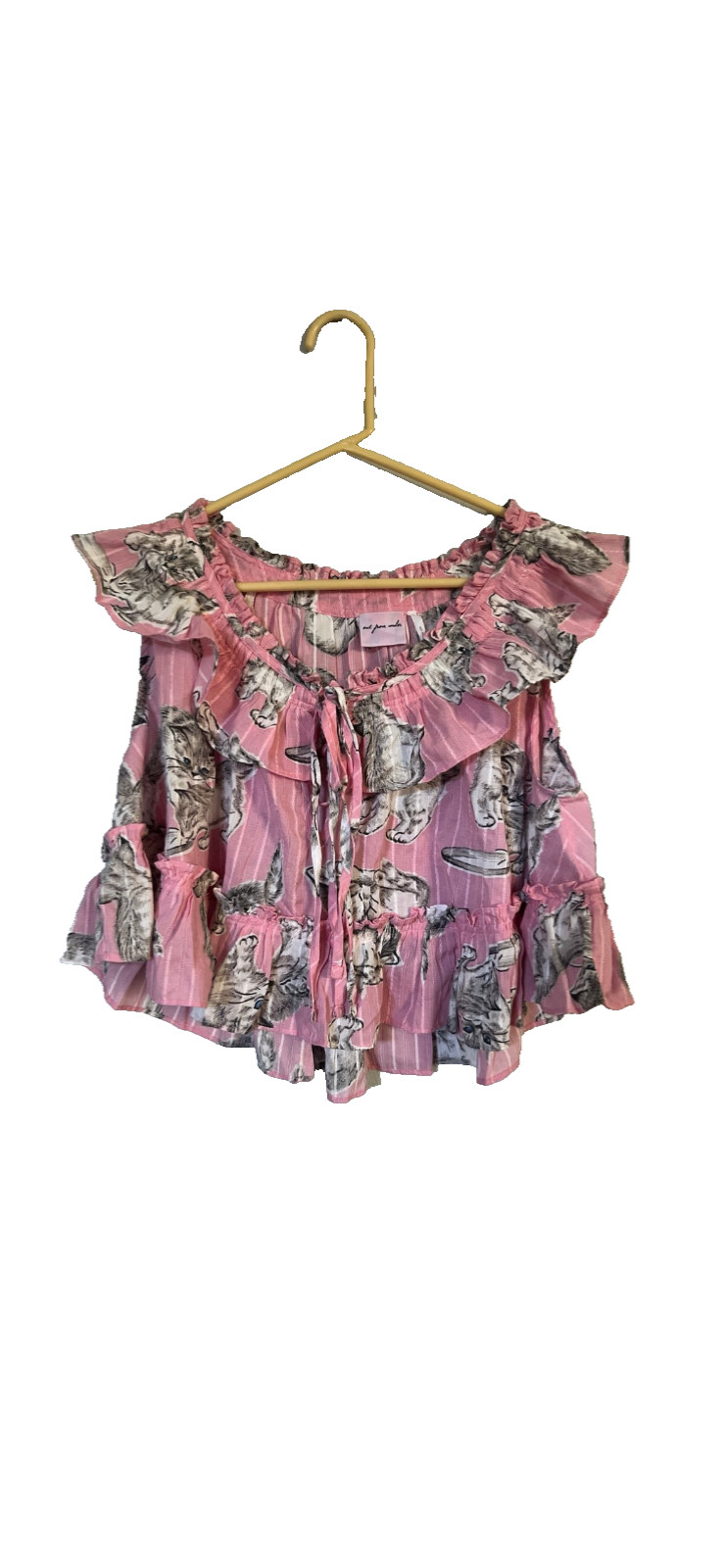 Out from under cat shirt