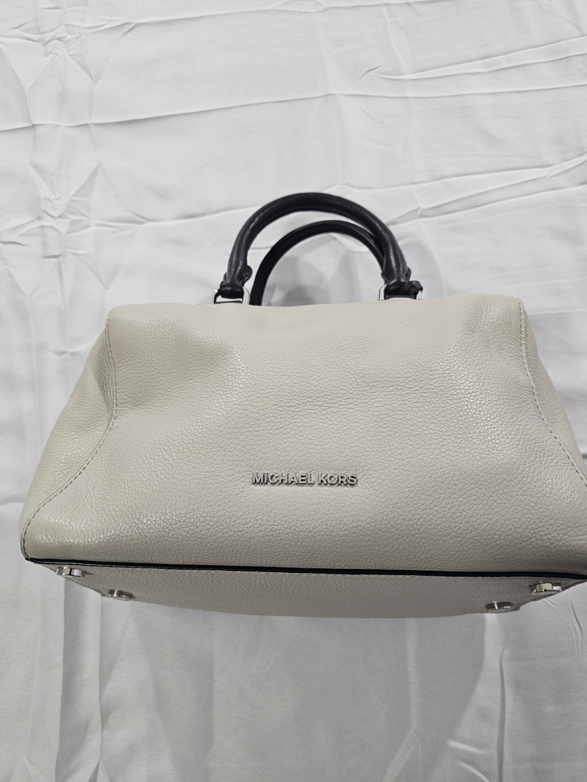 Michael Kors Kirby Large Leather Satchel feature Black Handles And Silver Logo