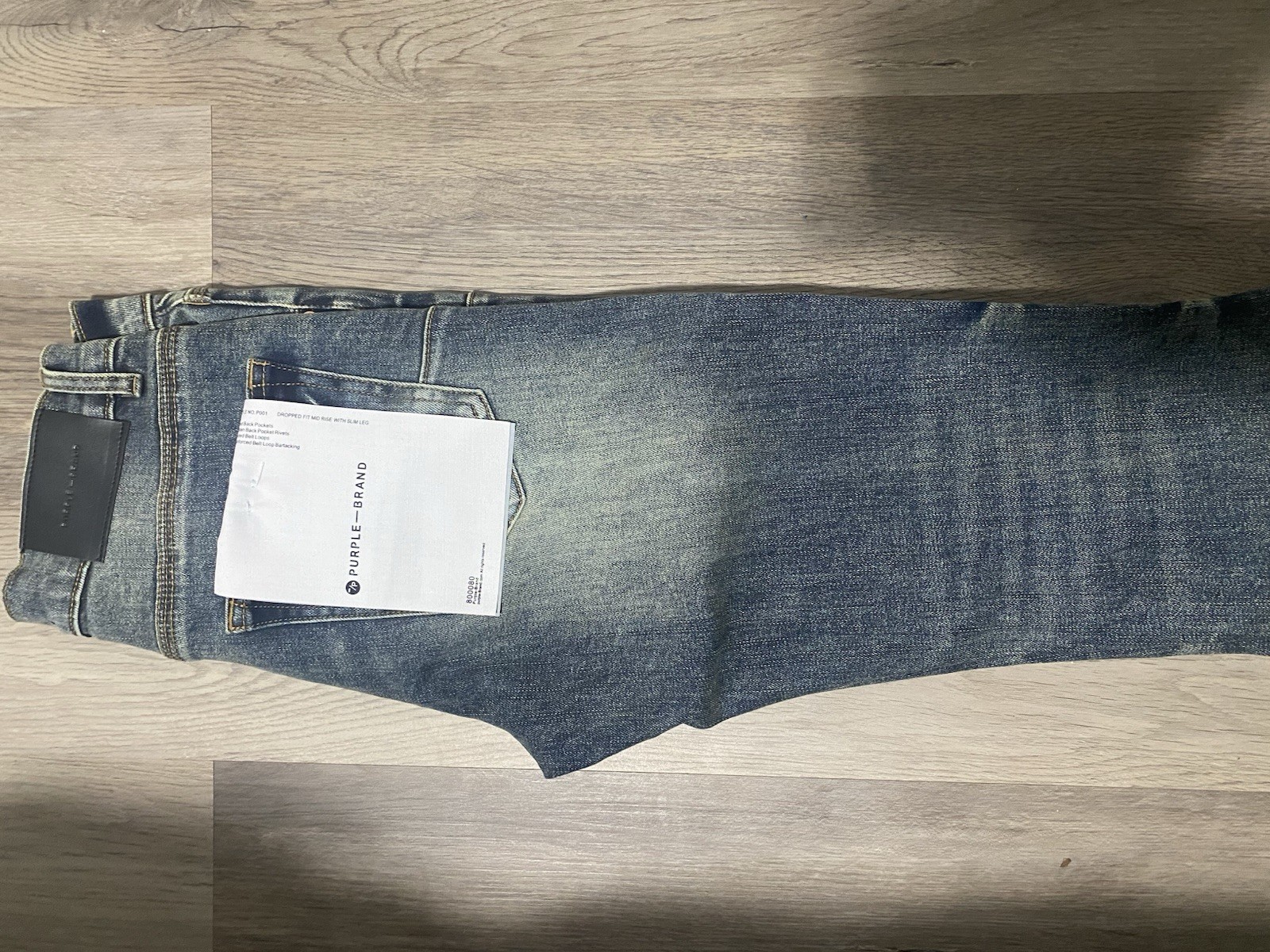Purple Brand light blue distressed denim slim fit straight jeans. Size 28