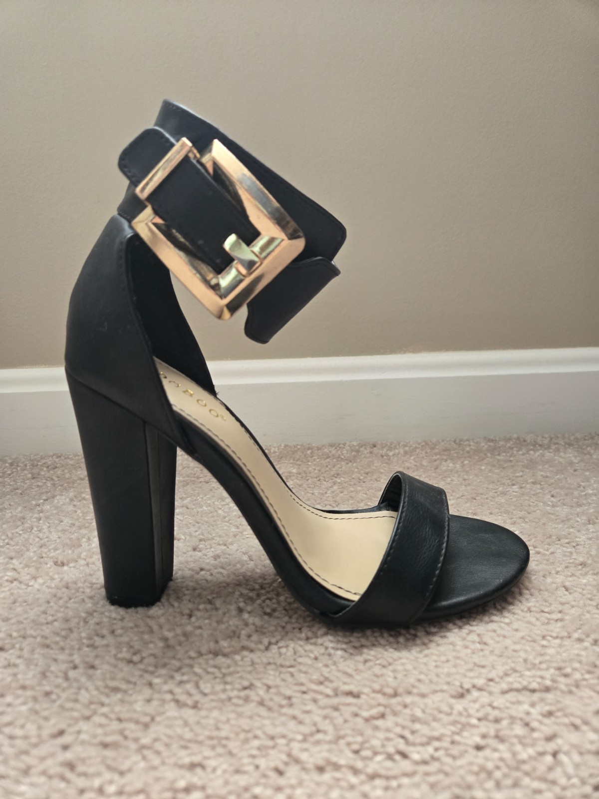 Black bamboo brand faux leather high heels size 6. Buckle strap