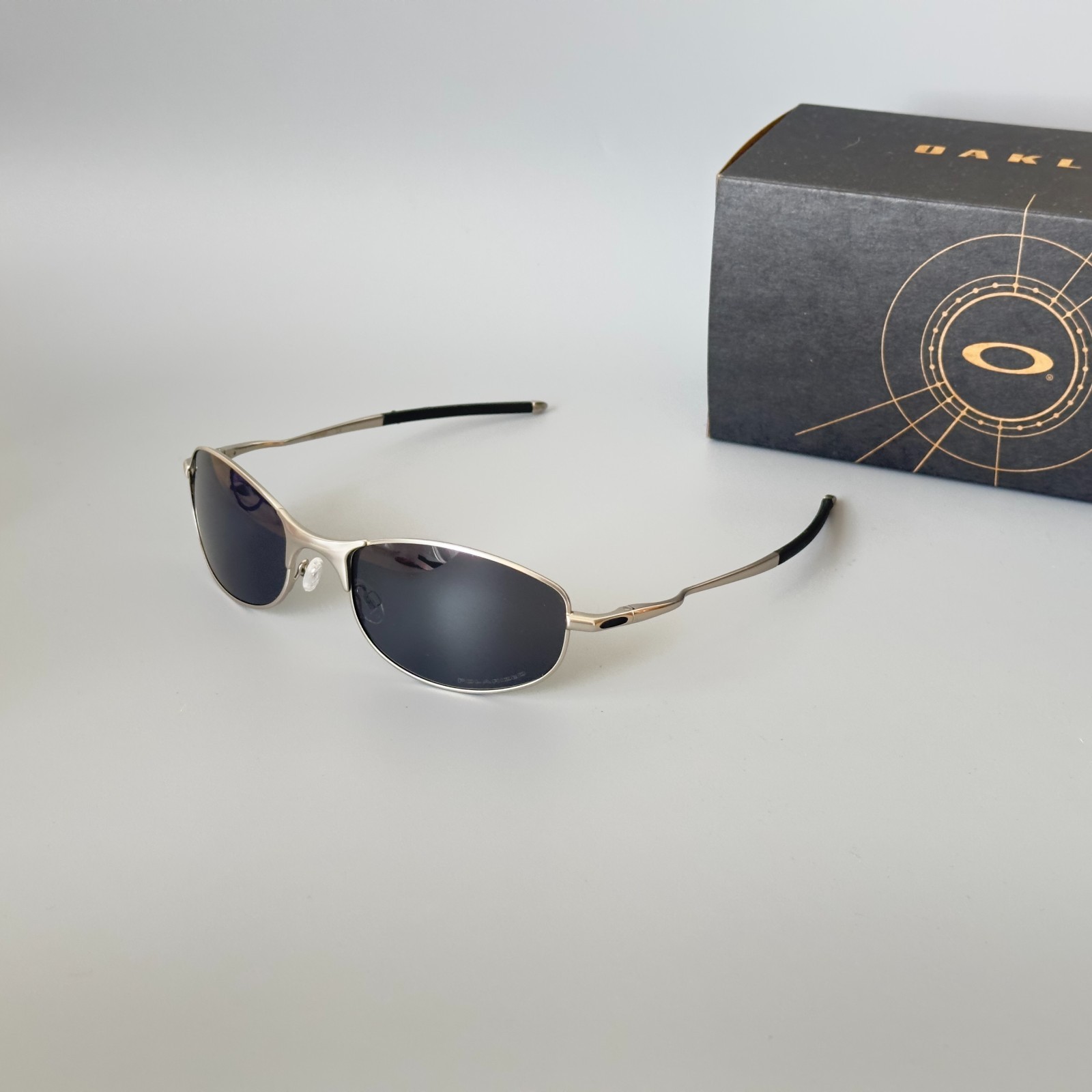 Oakley Tightrope OO4040 Polarized Sunglasses Silver Frame Black Lens
