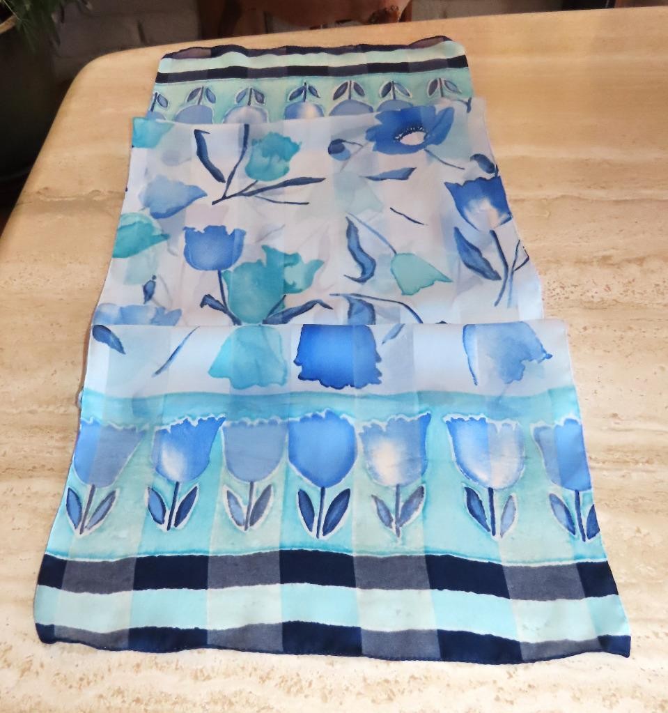 Oblong floral scarf; blue tones, white; 60×14.5 in. Semisheer; poly blend?