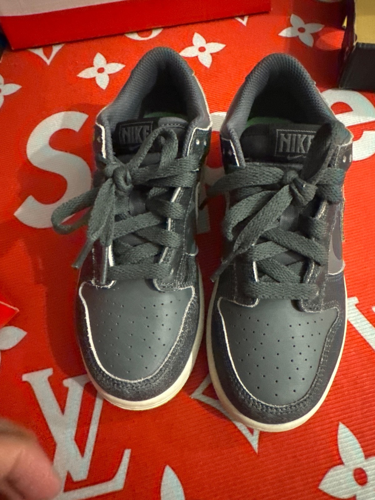 Nike Dunk Low SE “Halloween” sneakers in a grey and black colorway, featuring a