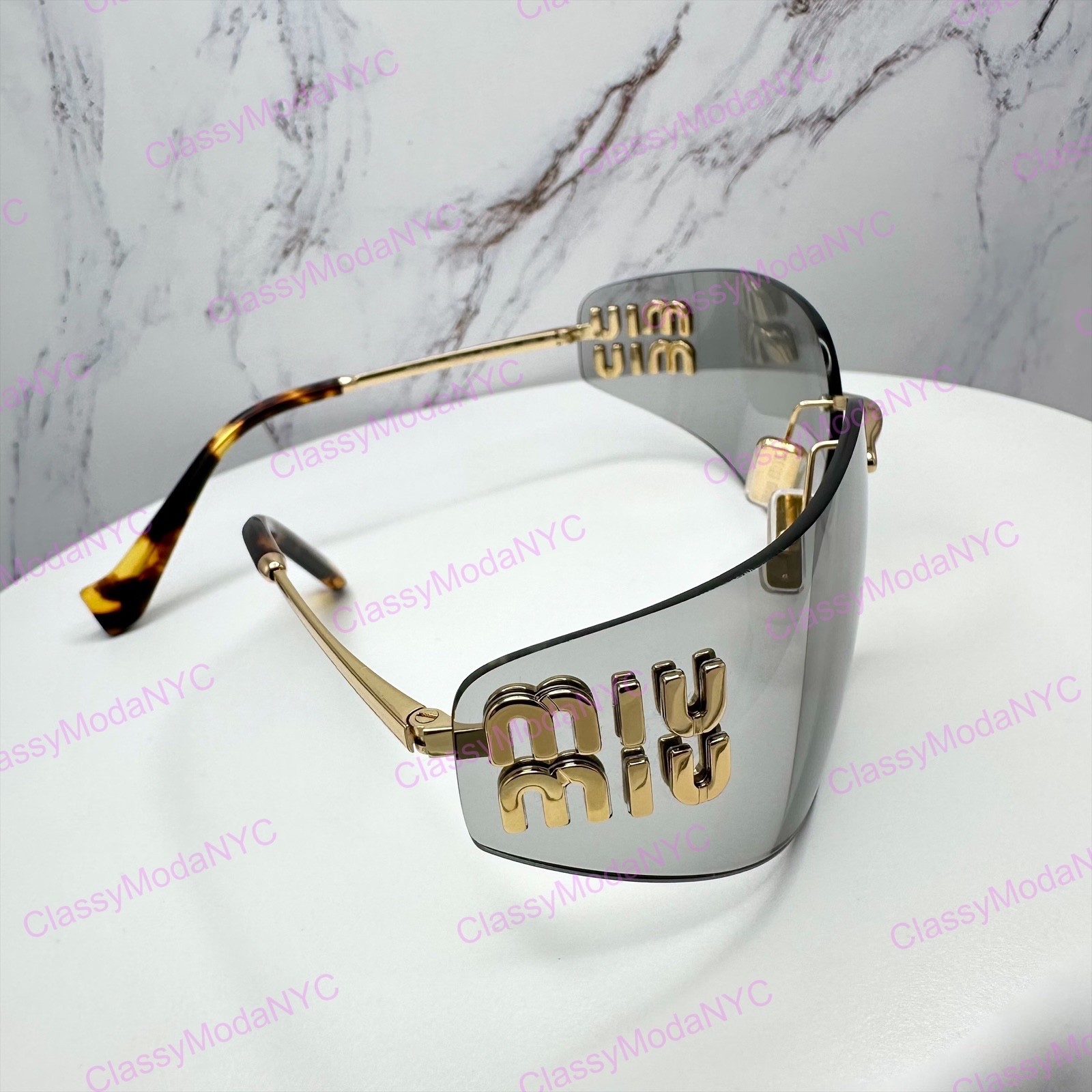 New MIU MIU Sunglasses Gold Slim Runway Wrap Rimless MU A51S 5AK50K Authentic