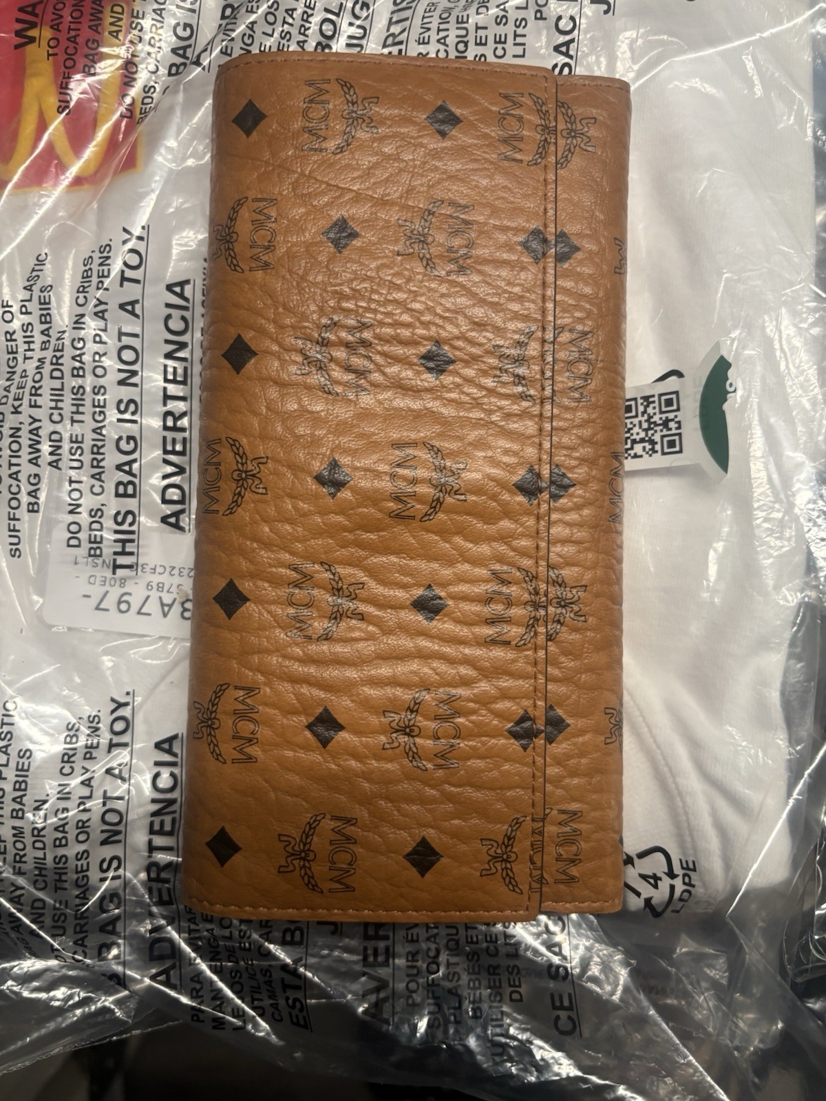 Authentic MCM Large Tri Fold Wallet in Visetos Original Cognac