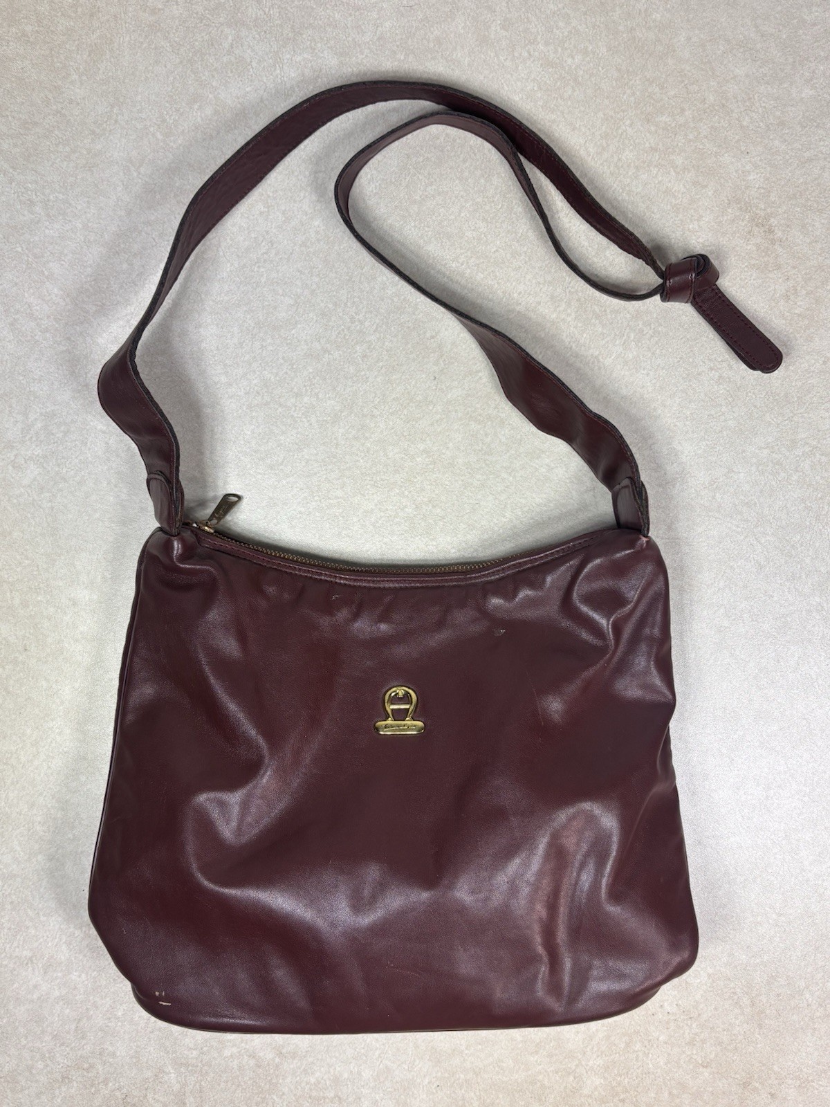1980s Etienne Aigner Oxblood Leather Knotted Hobo Bag Curved Scoop Purse
