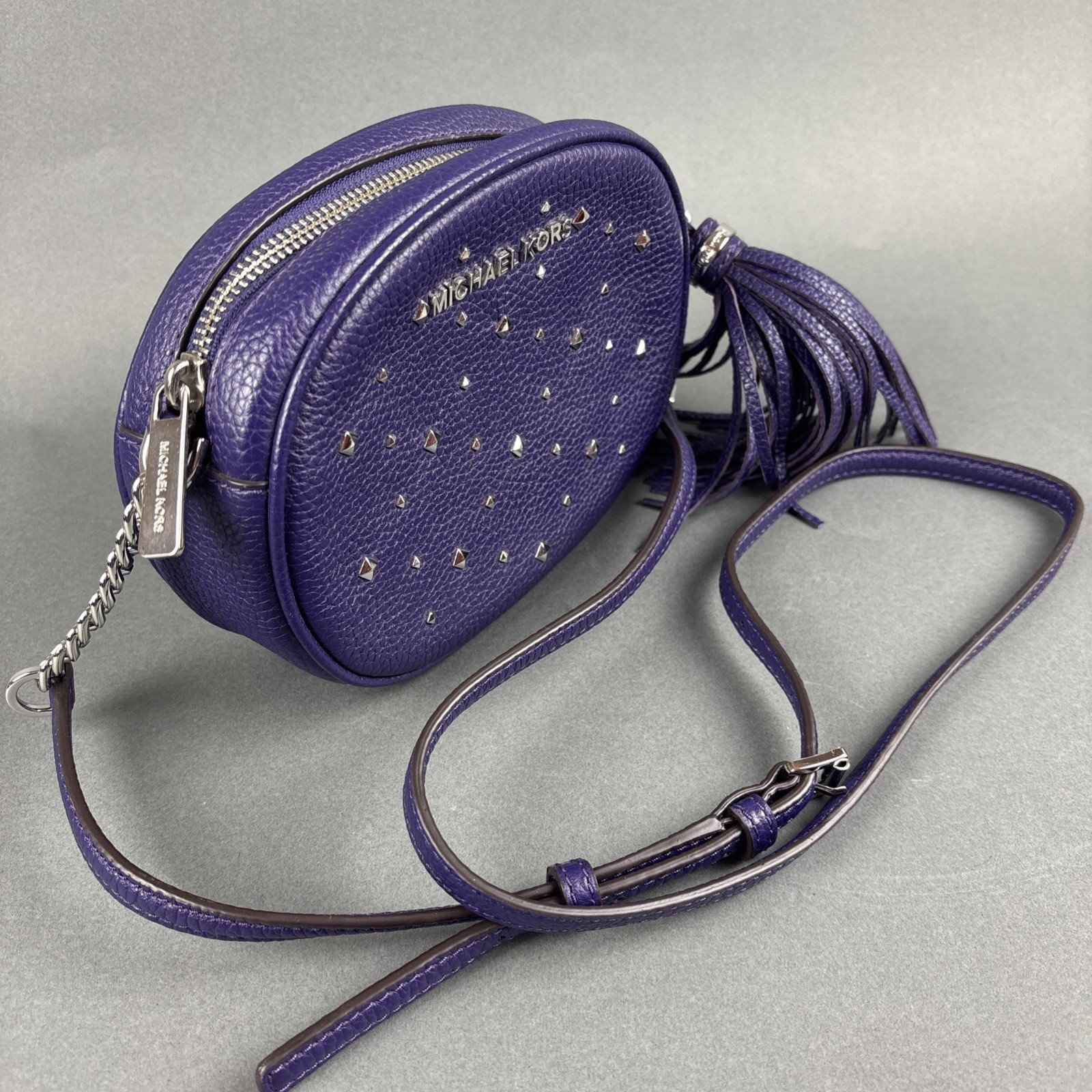 Michael Kors Purple Pebbled Leather Small Oval 7.75″x5.5″ Crossbody Bag w/Tassel