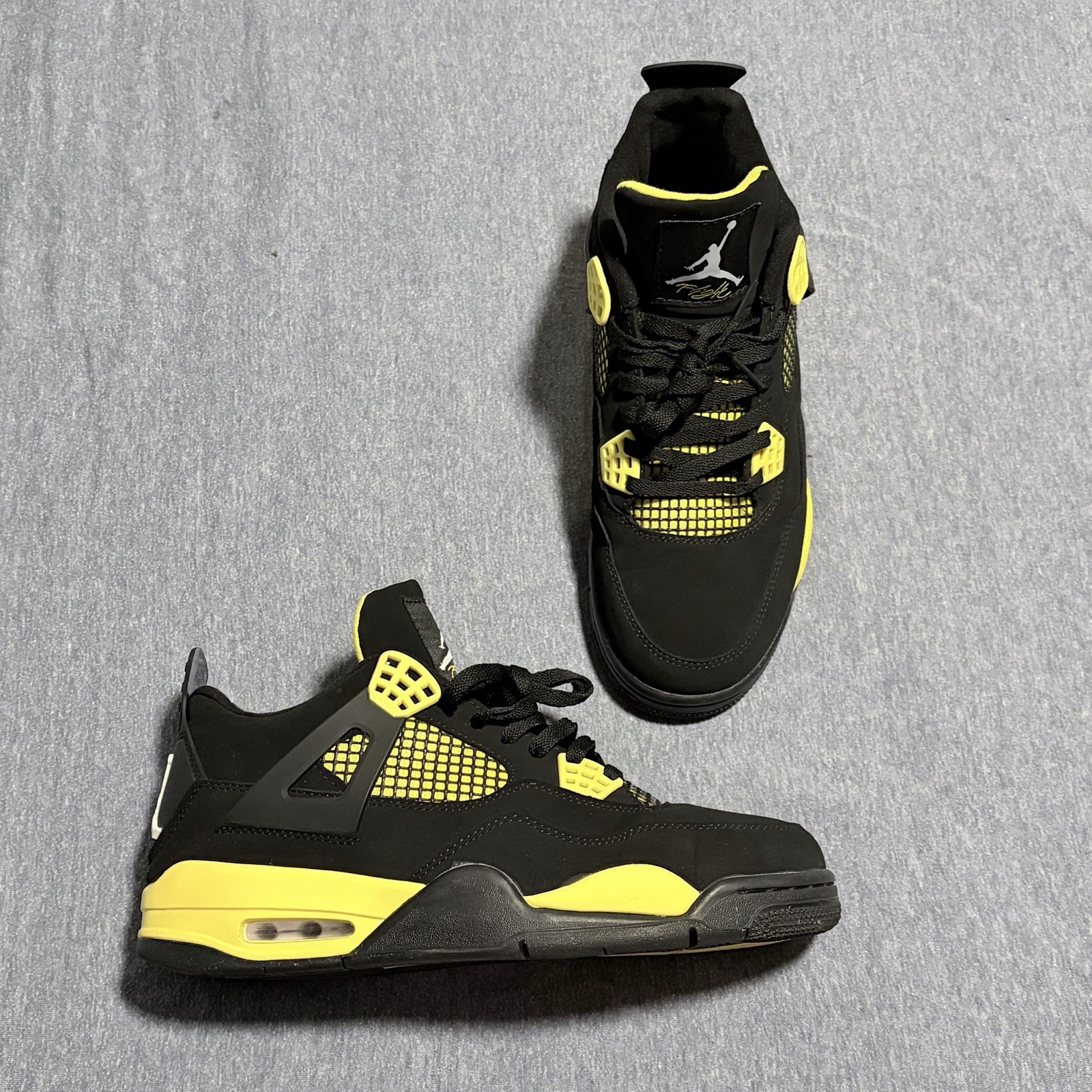 Jordan 4 Retro Thunder. Black/Tour Yellow DH6927-017
