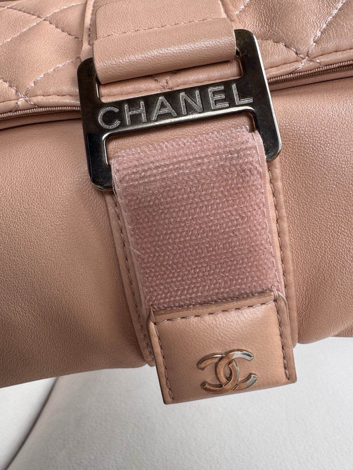 CHANEL Beige Quilted CC Logo Buckle Clutch Silver Hardware Inner Zipper