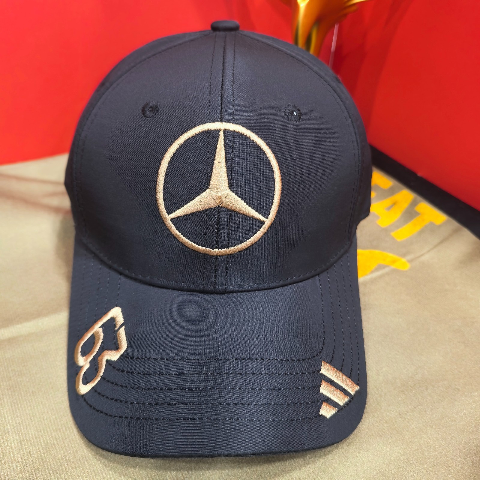 Mercedes-Benz #63 Black Adjustable Baseball Cap with Orange Embroidered Logo