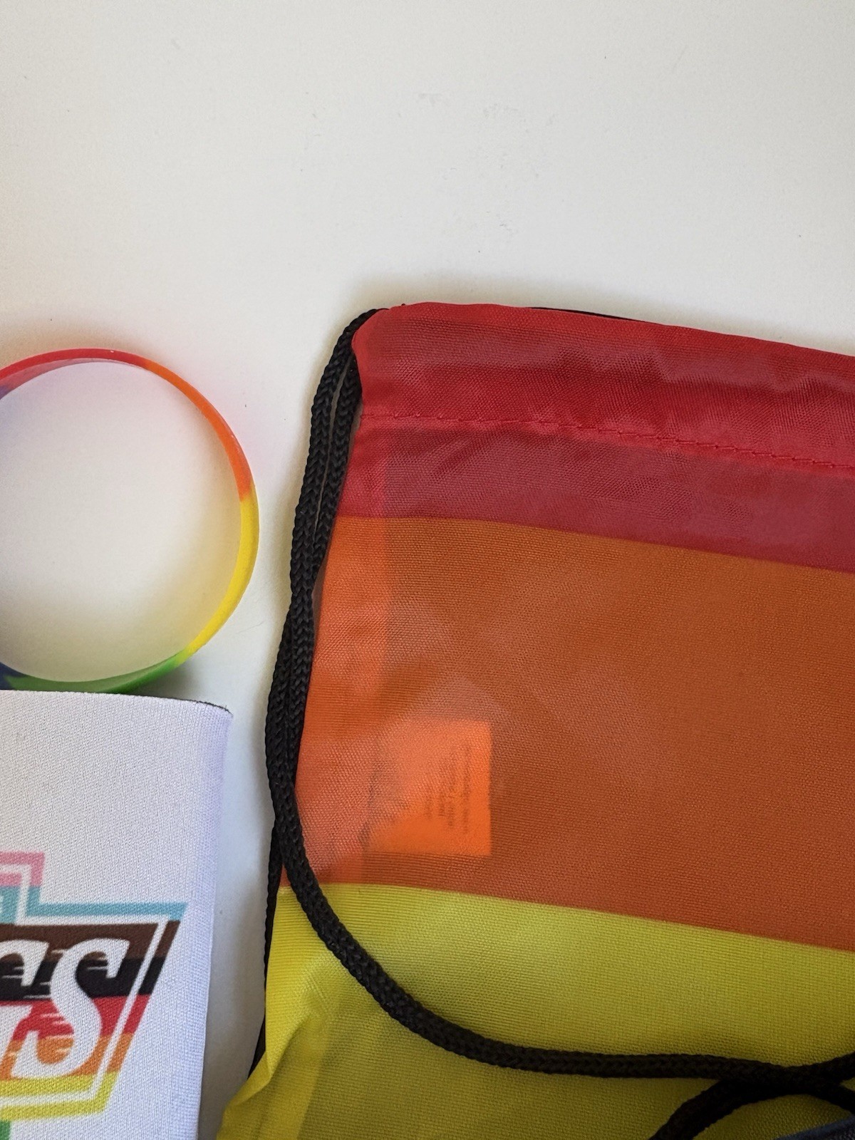 Optum Rainbow Pride Drawstring Backpack, Logo Accent, Adjustable Black Strap