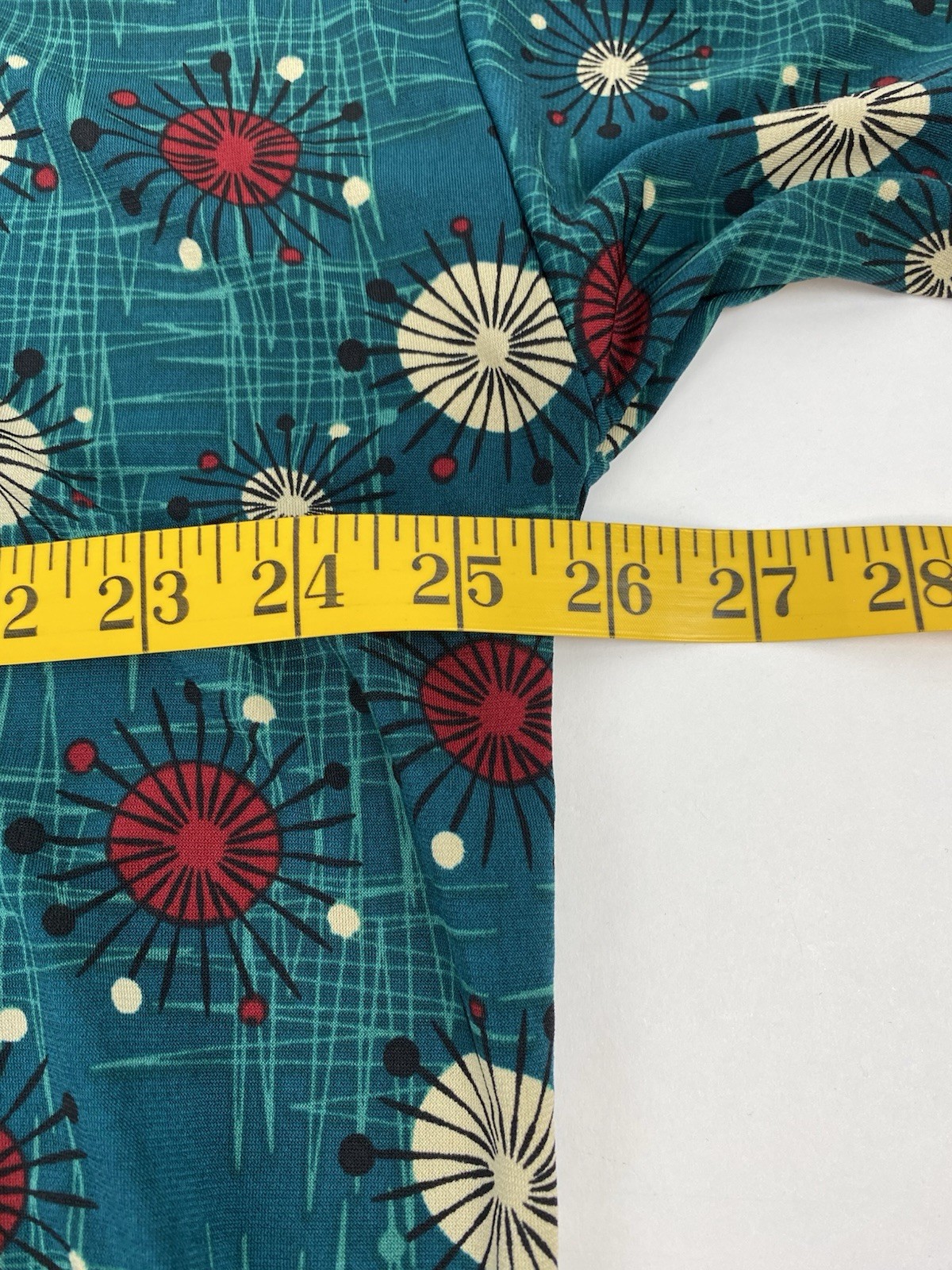 LulaRoe women’s stretch short sleeve green top hi-low measures 3X (see pictures)