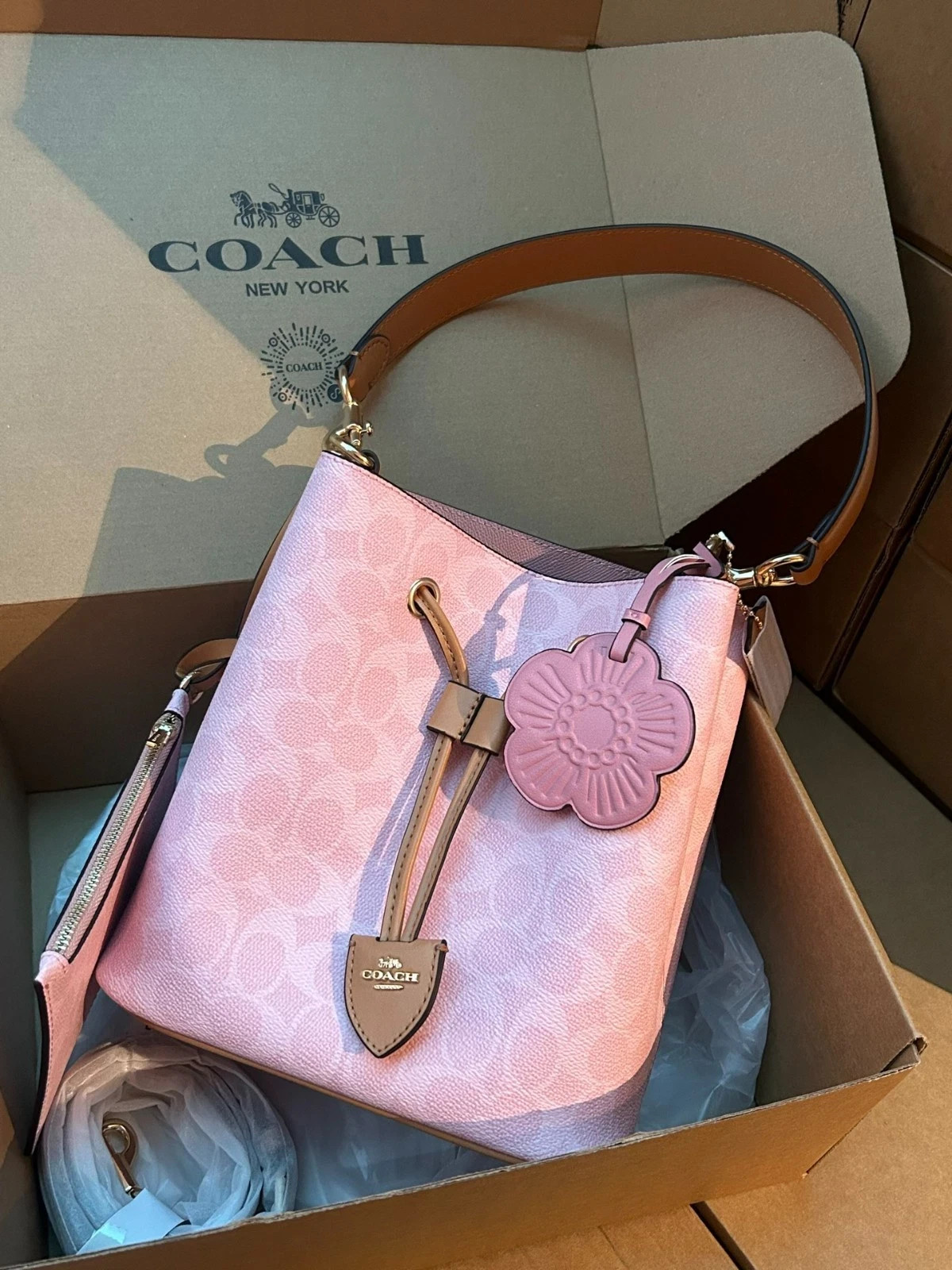 Coach CEA23 Rowan Bucket Bag In Signature Canvas With Charms Powder Pink