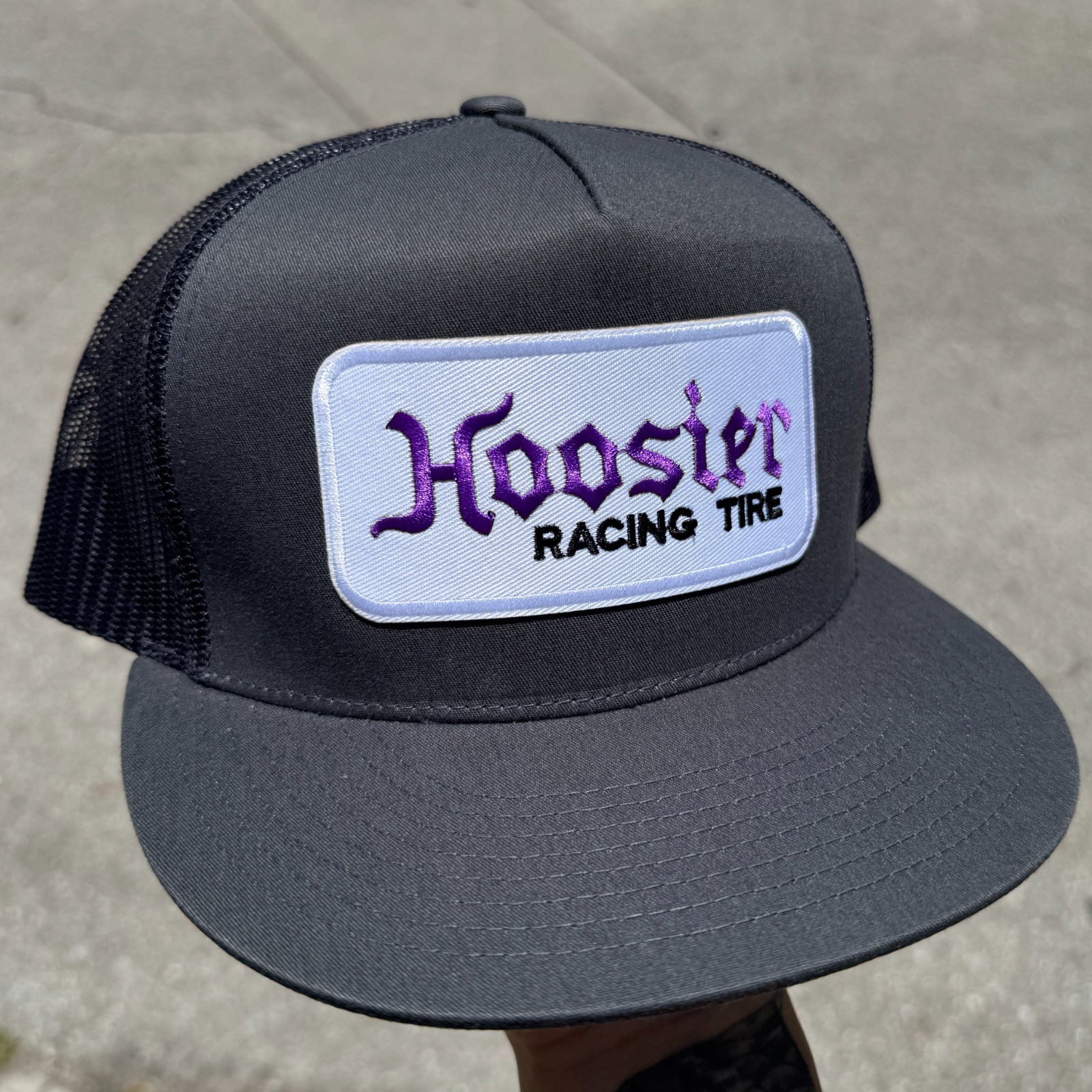 Hoosier Patch on Yupoong 6006 Snapback Trucker Hat Classic Mesh Back Charcoal
