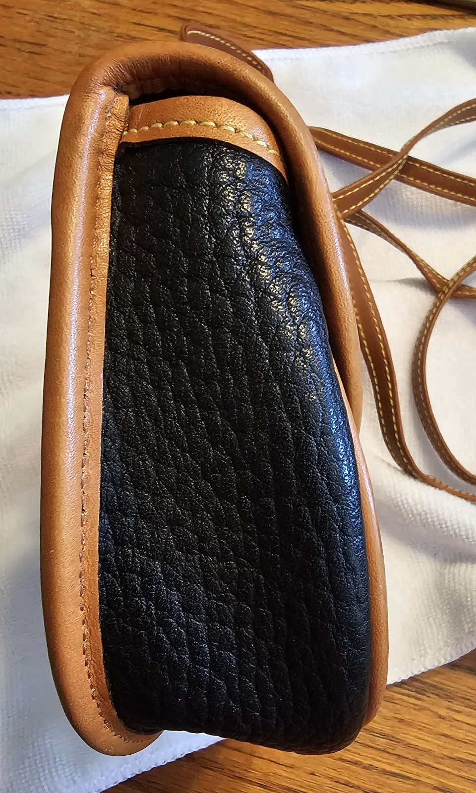 Dooney & Bourke Calvary Black/Brown Crossbody, Gold Hardware Charm.