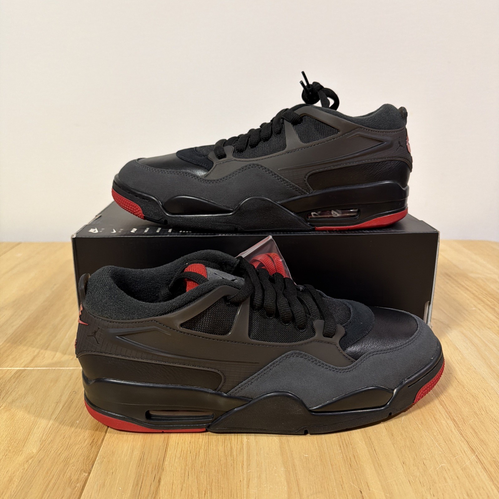 Men’s Size 12 – Air Jordan 4 RM Black Varsity Red FQ7939-060