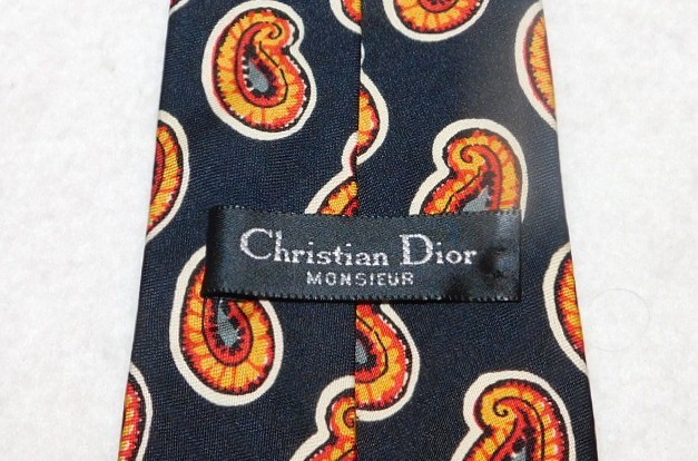 CHRISTIAN DIOR MADE IN U.S.A. BLACK/BROWN/YELLOW/RED PAISLEY TIE – DESIGNER TIES