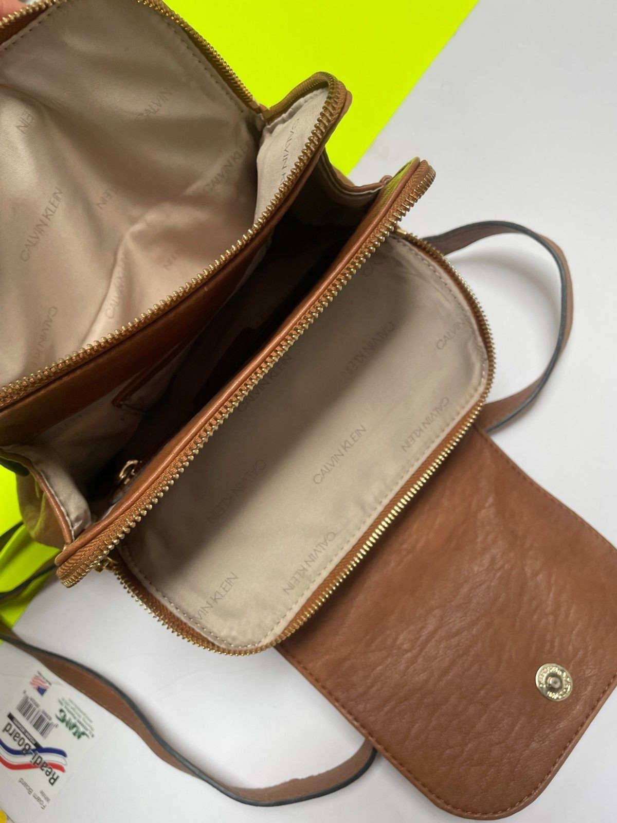 Calvin Klein Reyna Novelty Key Item Flap Backpack Caramel Color