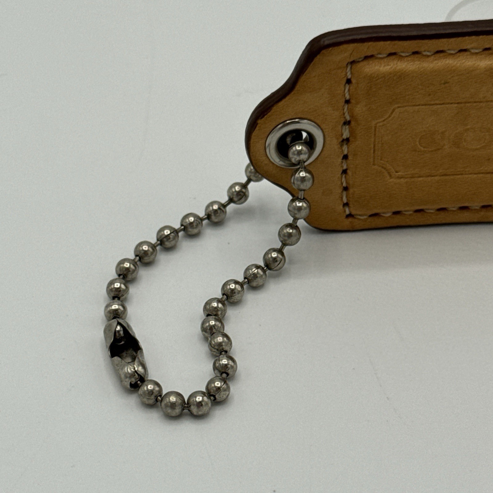 Coach Hang Tag Light Brown Leather Colored 2 & 1/2 Inches Wide / Silver Tone