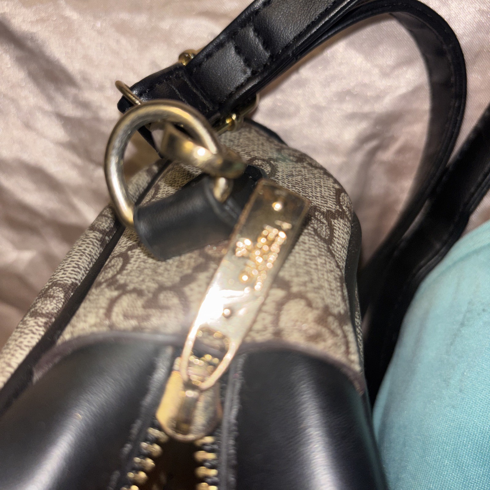 This is a Gucci GG Supreme Ophidia camera-style shoulder bag.