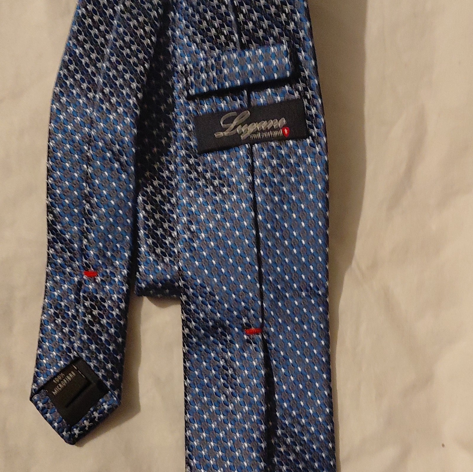 Synnax Blue Black White Geometric Men’s Pointed Tie Logo Accent