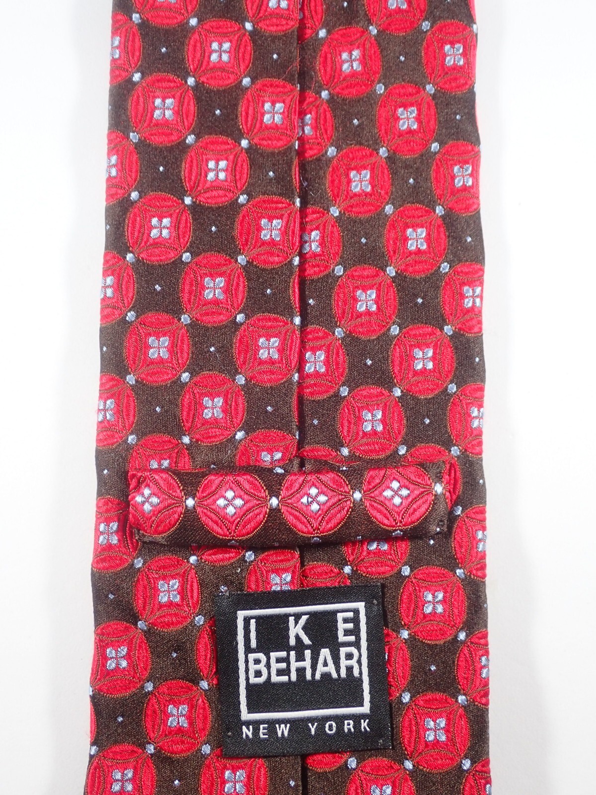 IKE BEHAR BLACK w/ RED CIRCLES & BLUE CENTERS 100% SILK NECK TIE