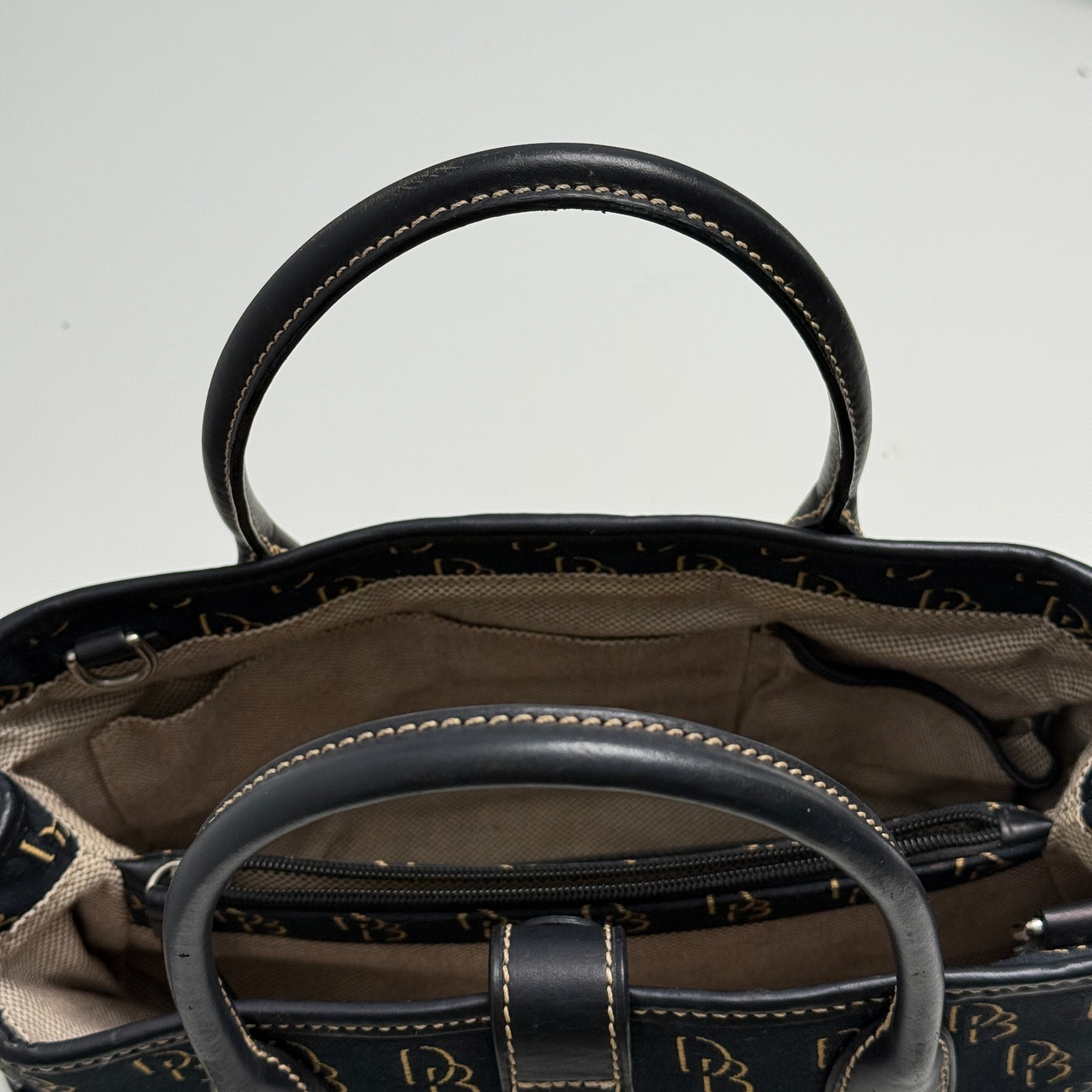 Dooney & Bourke DB Monogram Satchel Purse Black Gold Leather Trim Push Lock