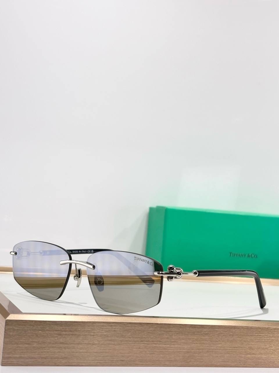 Tiffany & Co. Rimless Rectangle Sunglasses Silver Frame Brown Lenses Unisex Luxu