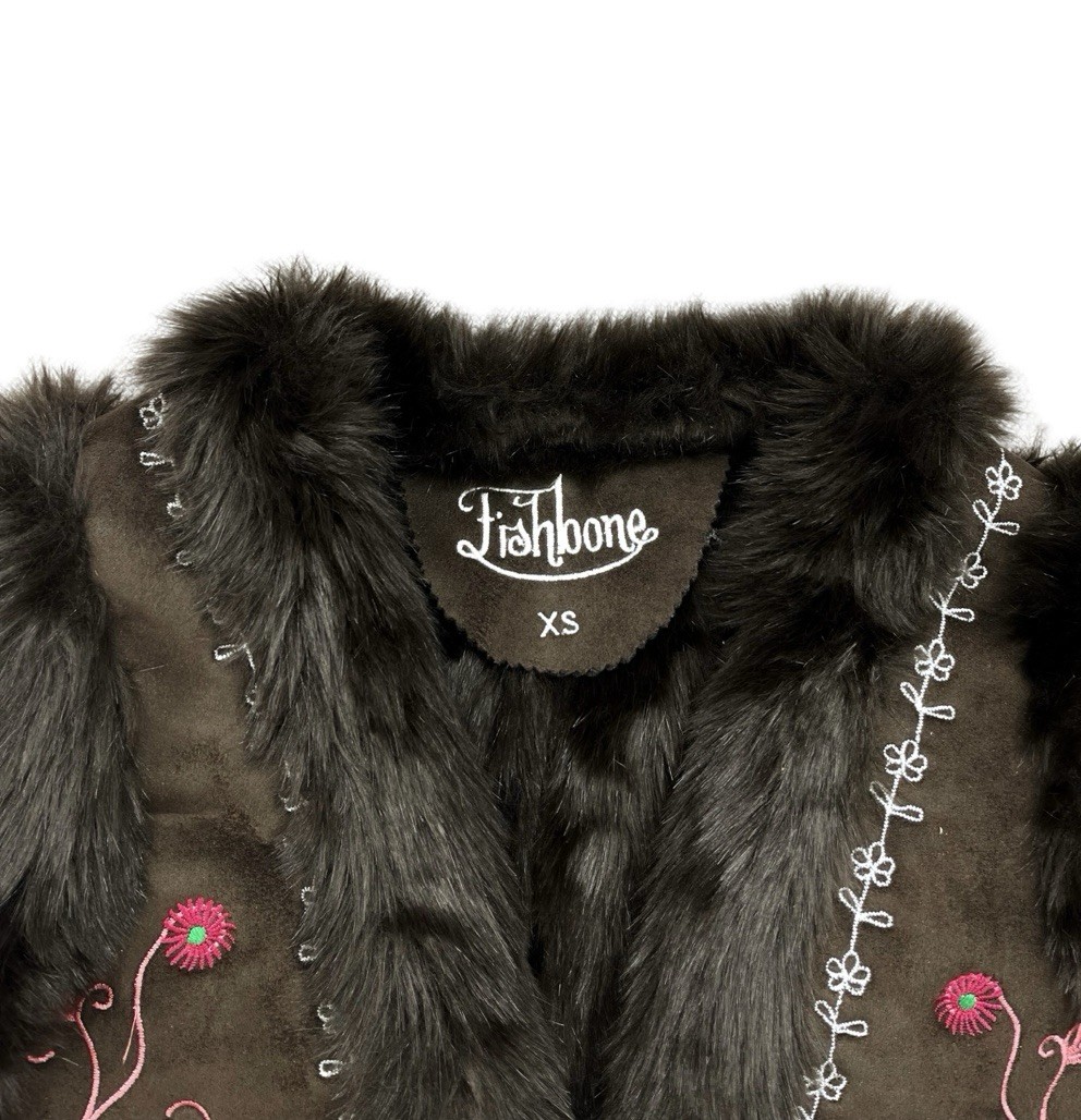 The ultimate Y2K boho chic embroidered faux fur vest