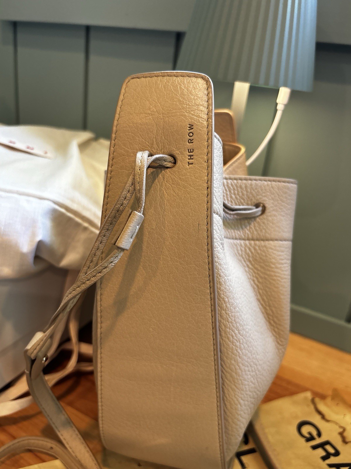 THE ROW Beige Pebbled Drawstring Bucket Crossbody Bag Gold Hardware