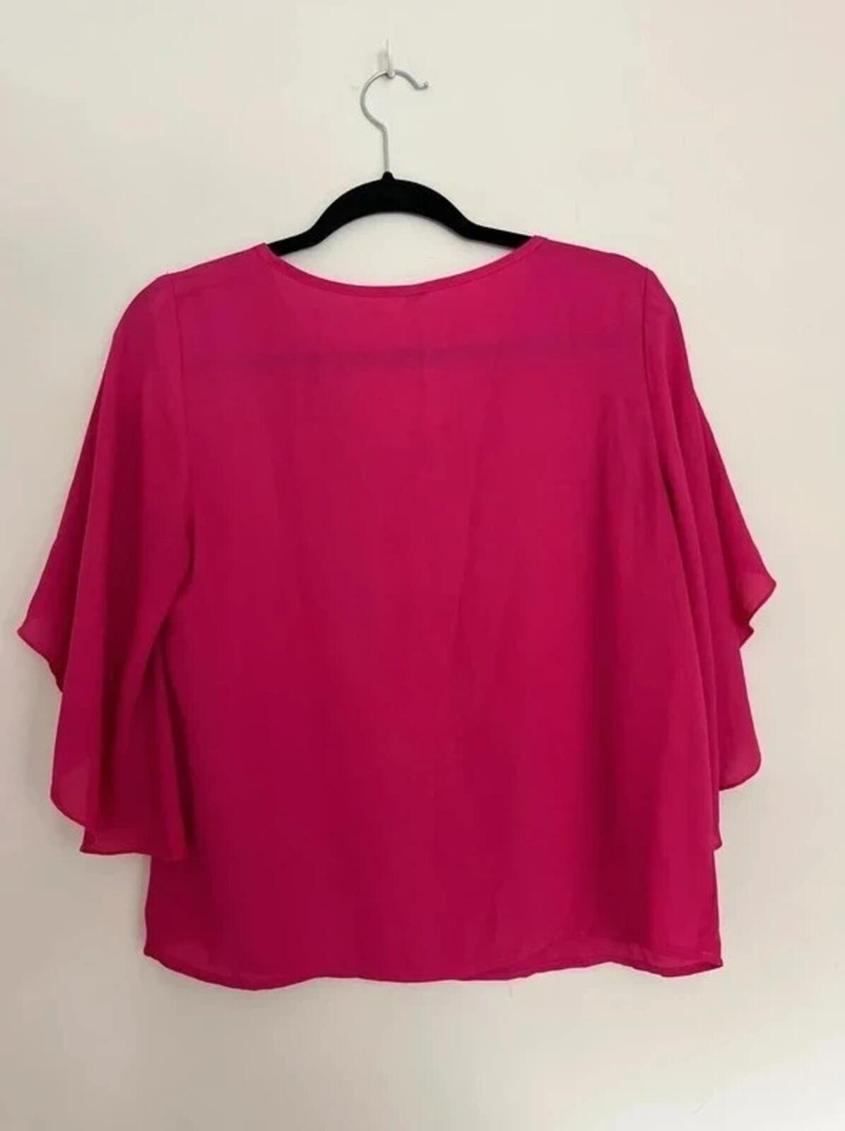 Hot pink chiffon top with flowing sleeves – approx. size 6/8