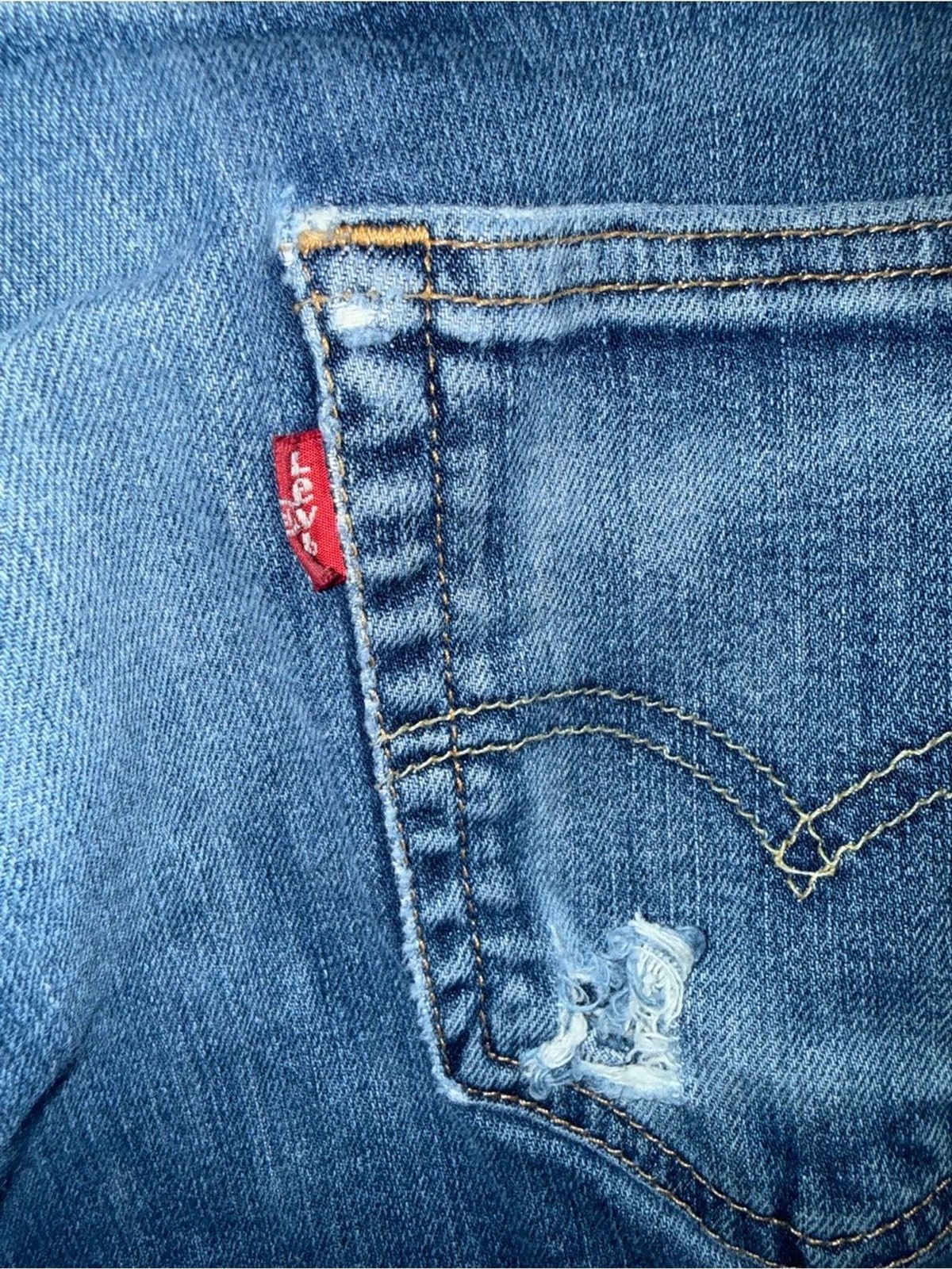Levi’s Blue Denim Jeans with Tan Leather Patch