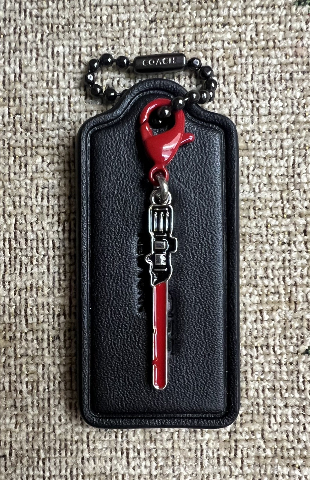 Coach Large 2.25” Black HangTag Star Wars Sith / Jedi Red Light Saber Charm New