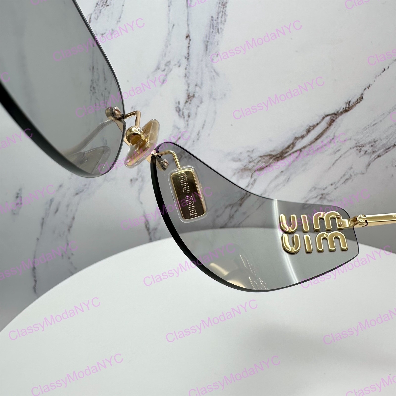New MIU MIU Sunglasses Gold Slim Runway Wrap Rimless MU A51S 5AK50K Authentic