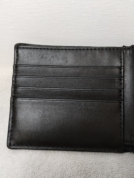 MICHAEL KORS black leather mens wallet, good condition, dual bill slots