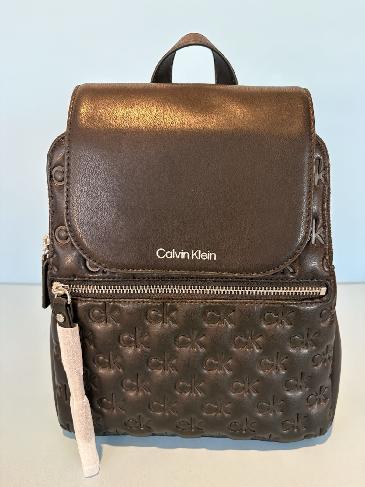 Calvin Klein Black Reyna Signature Embossed flap backpack-New with Tags