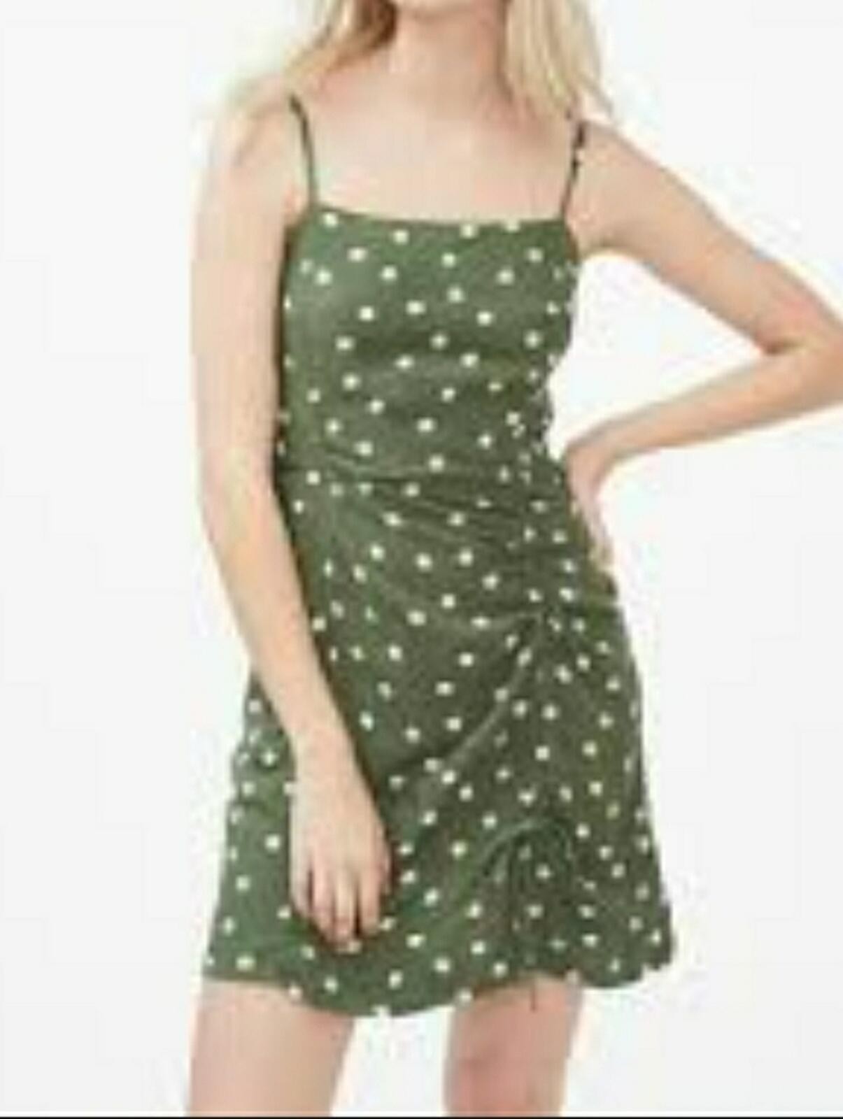 Aéropostale polka dot sundress featuring a ruched design and adjustable straps.