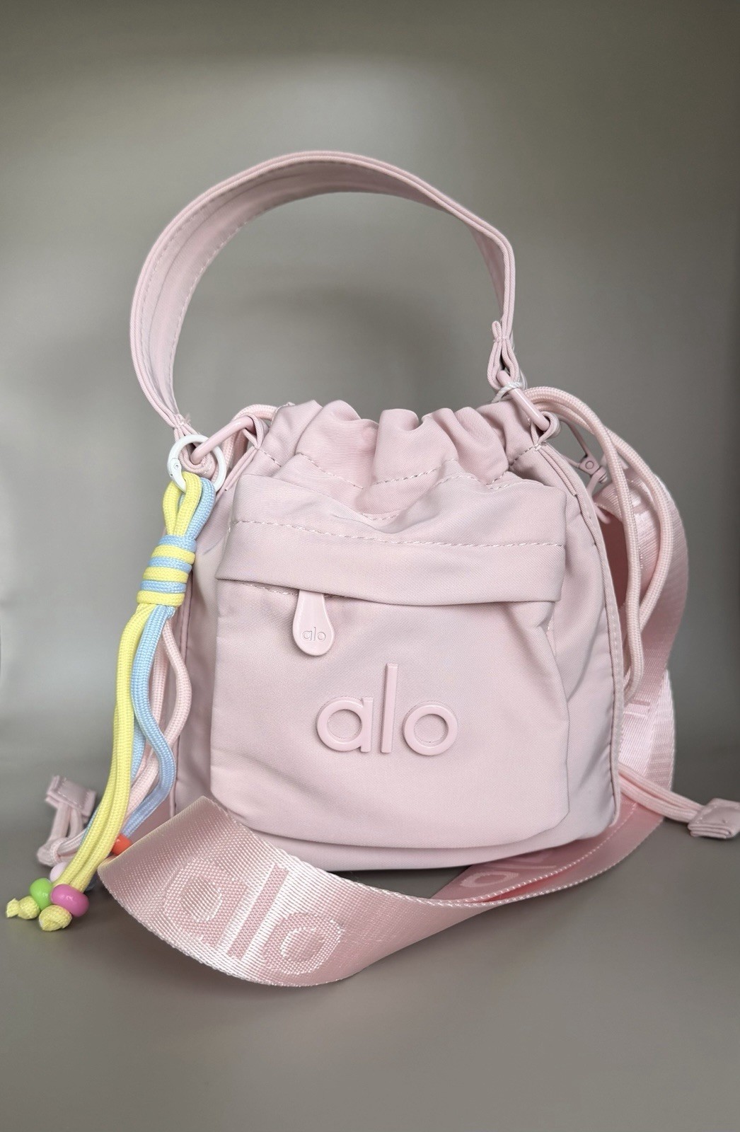 Alo Yoga Baby Pink Crossbody Bag with Detachable Strap, Drawstring