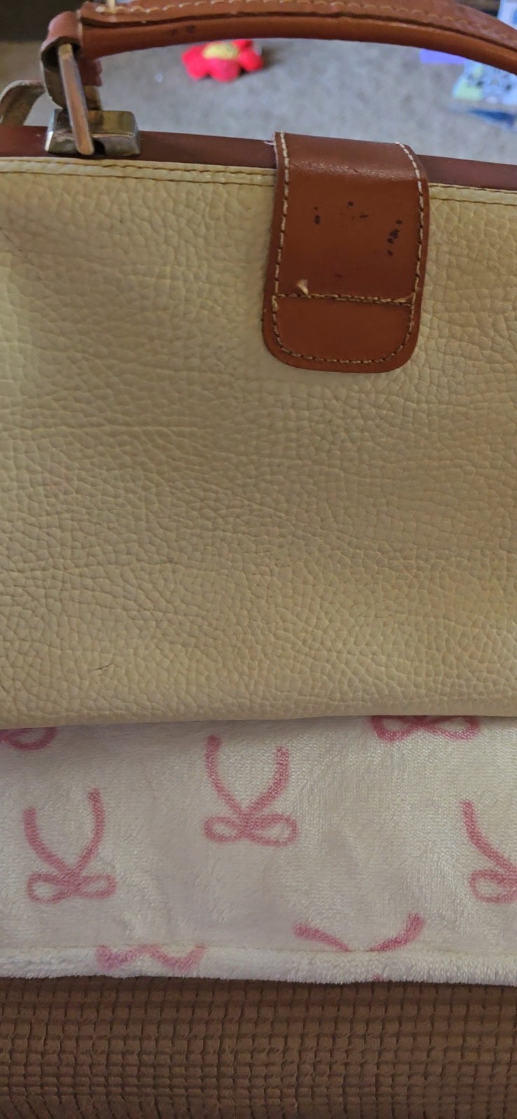 Dooney And Bourke Vintage all weather leather purse. 11 inches across and 7 t