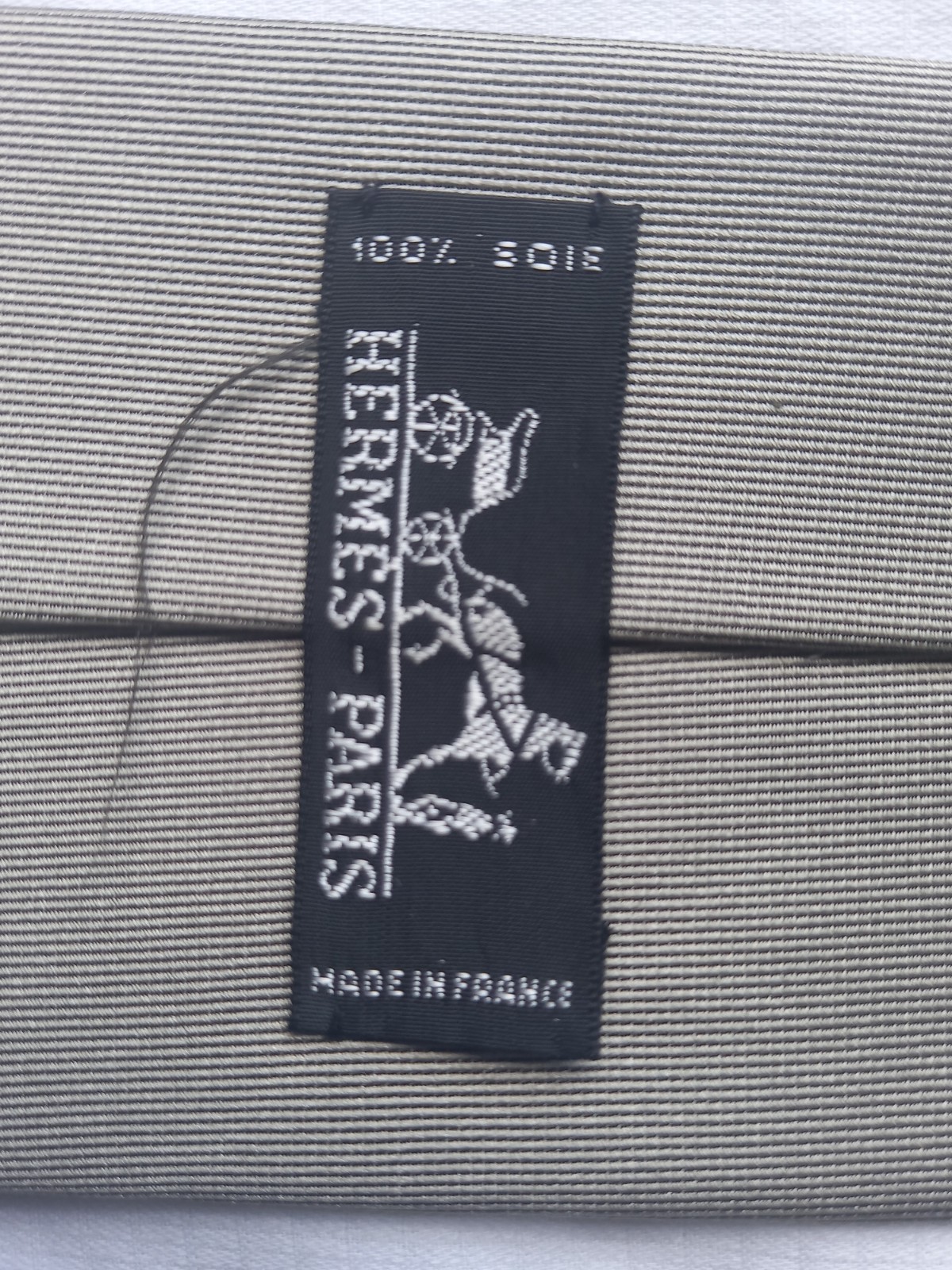 GRAY SOLID COLOR TIE BRAND: HÈRMES, FRANCE
