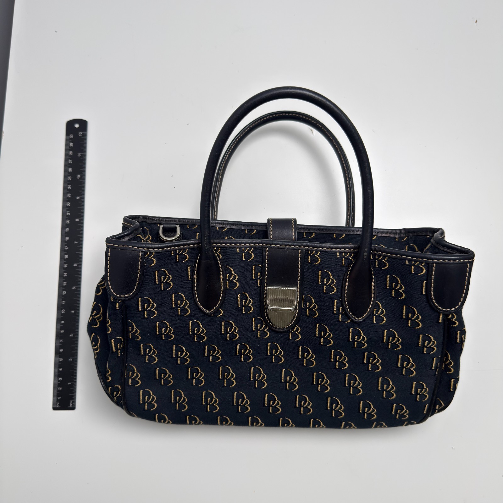 Dooney & Bourke DB Monogram Satchel Purse Black Gold Leather Trim Push Lock