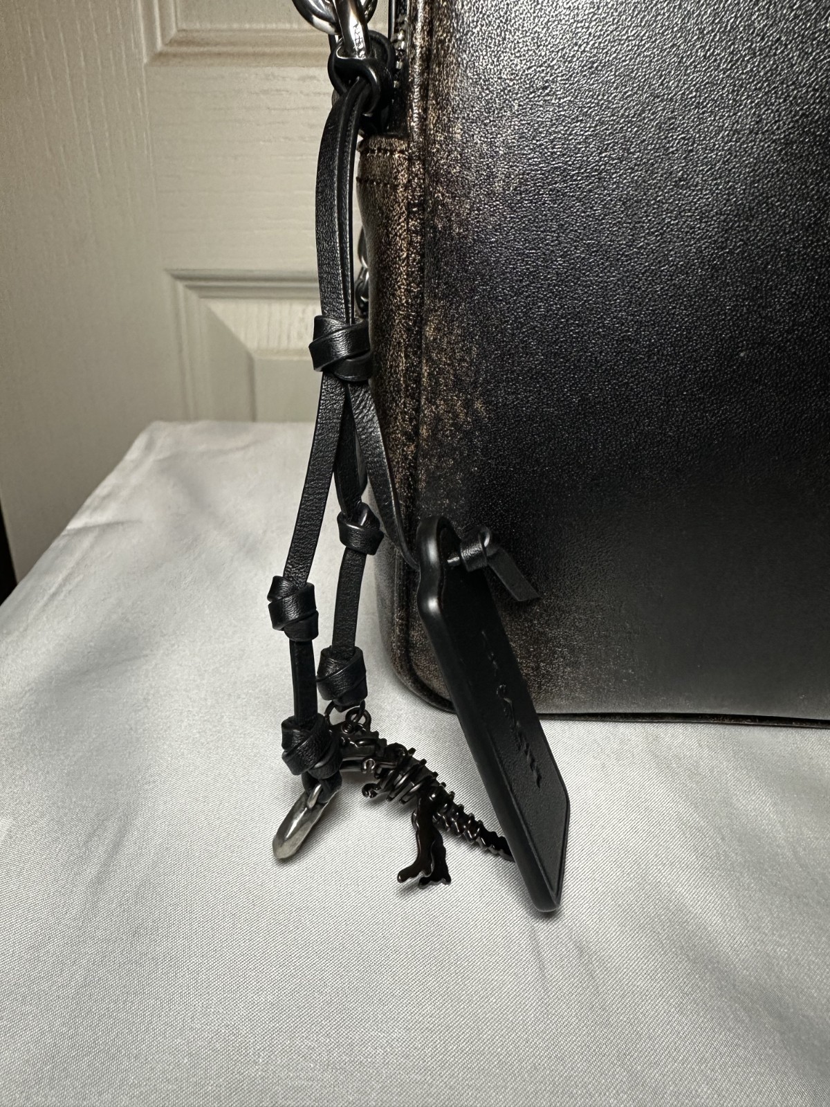 Coach Dakota Crossbody Bag in Loved Leather. Black/Light Tan. CDS84