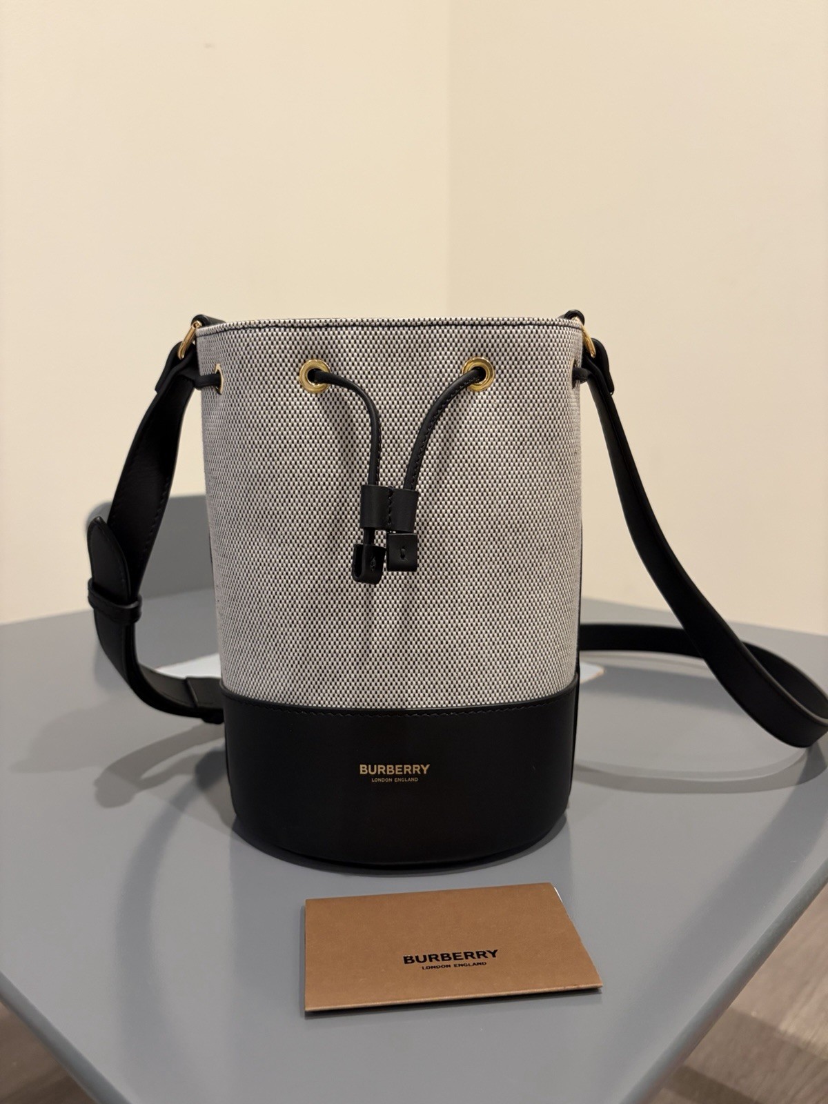 Burberry Black/Beige Bucket Drawstring Crossbody Bag Gold HW Logo Brand Card