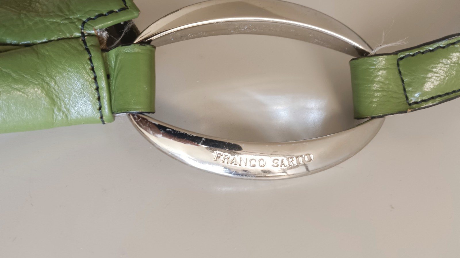 Franco Sarto purse green. Large silver colored handle ring. Pre-owned in great c
