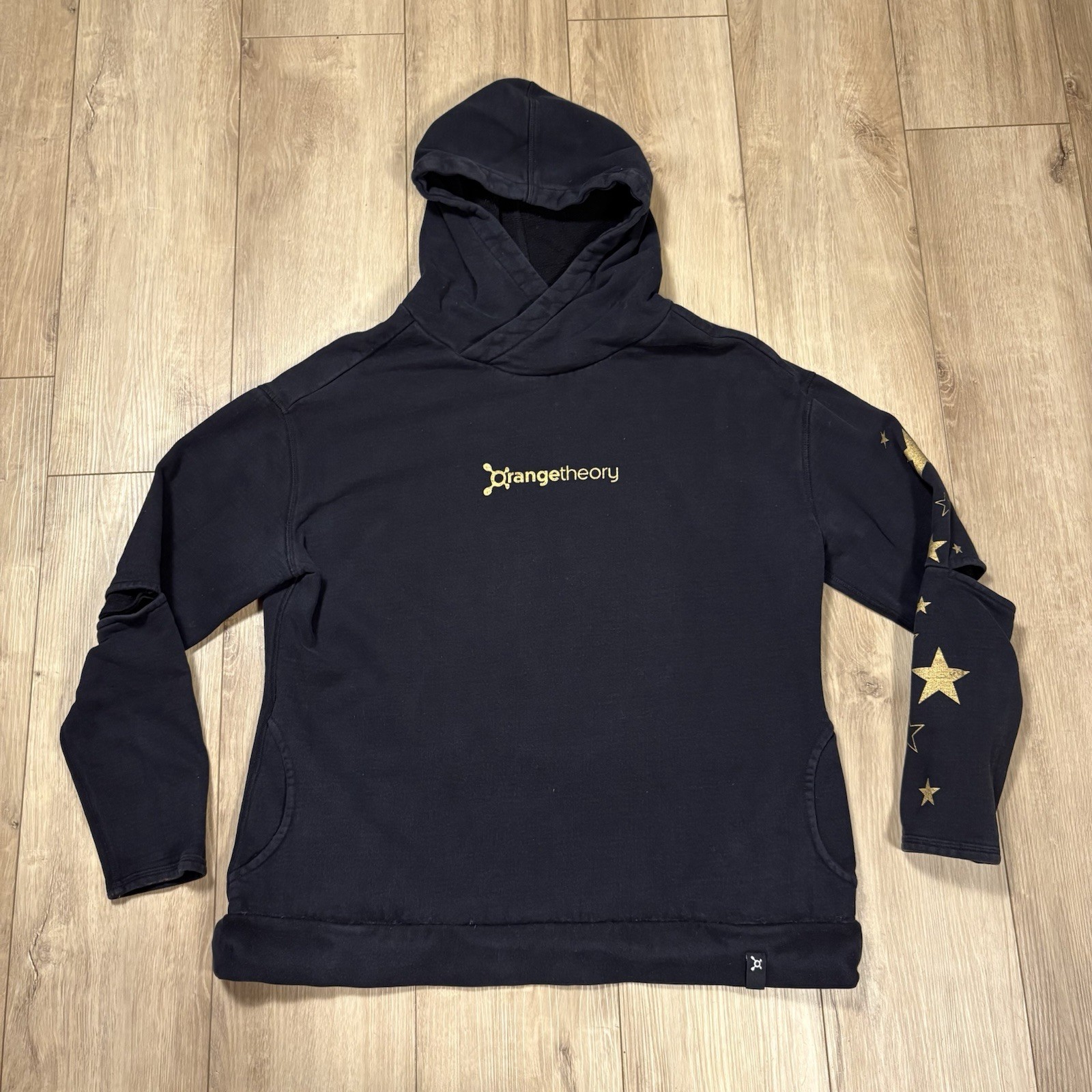 Orange Theory FITNESS Black Pullover Cold Elbow Gold Foil Star Sweatshirt M