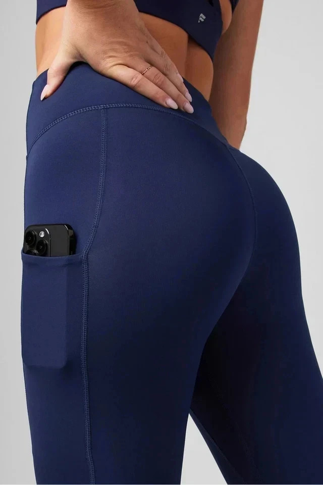 Fabletics Women’s Oasis Pureluxe High Waist With Pockets Legging, Navy, Size S