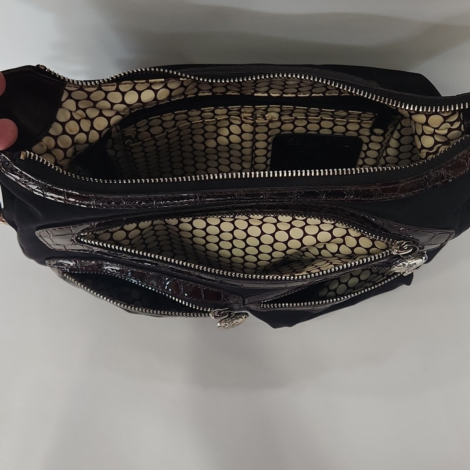 Brighton Black Crossbody Bag, Adjustable Strap, Zip, Pockets, Charm