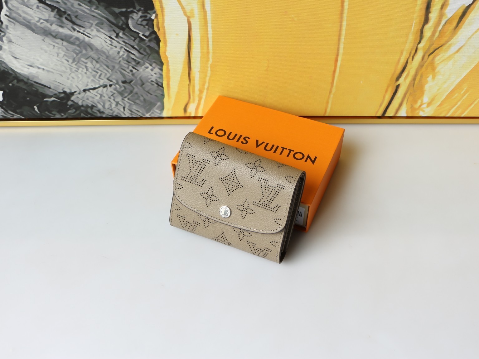 LOUIS Beige Mahina Perforated Leather Iris Compact Wallet