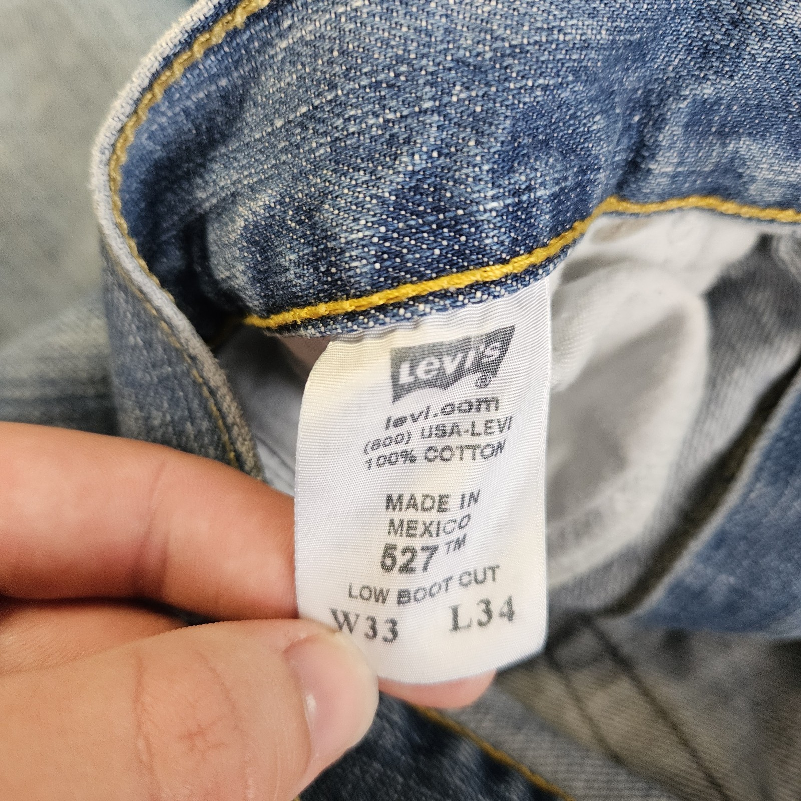 Levi’s 527 Denim Jeans Low Boot Cut Men’s 33×34 Blue Distressed Med Wash